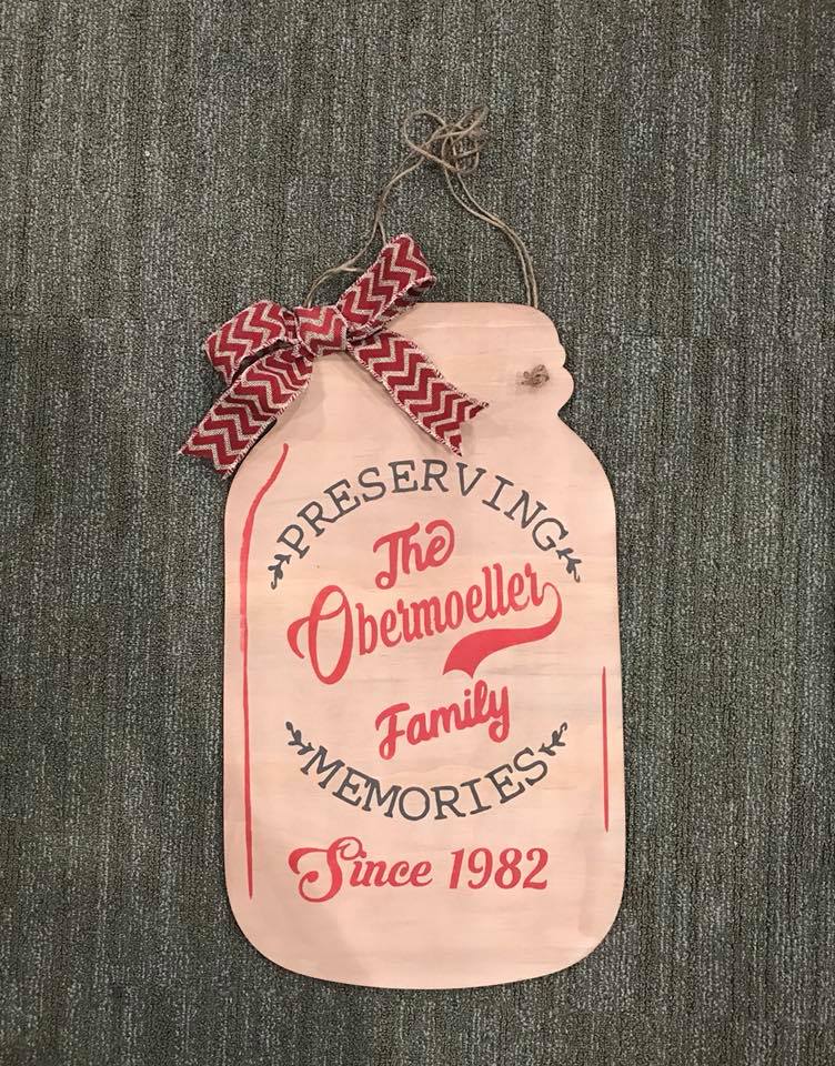 Door hanger mason jar preserving family name and date