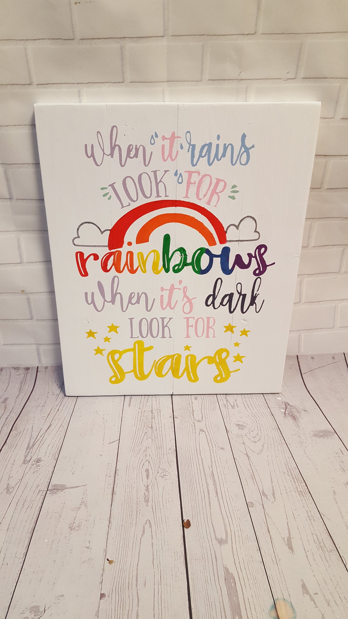 When it rains look for rainbows when its dark look for stars