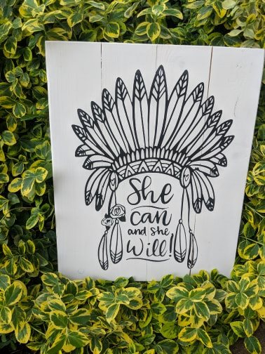 She can and she will Indian head dress