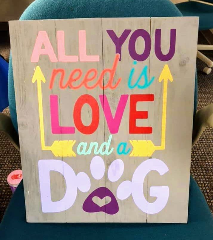 All you need is love and a dog with arrows and pawprint