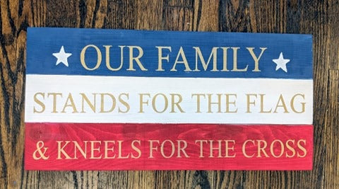 Our family stands for the flag and kneels for the cross