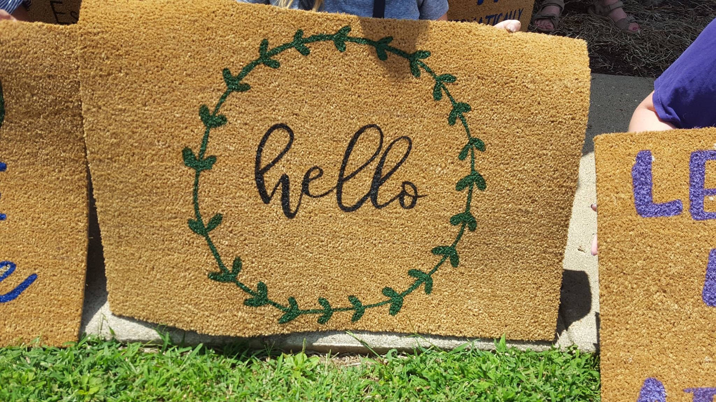 hello with leafy wreath