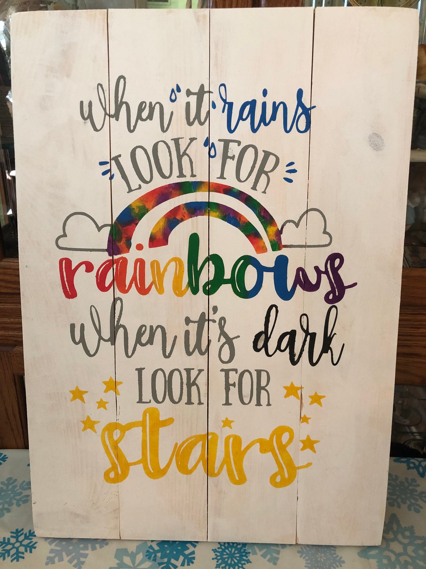 When it rains look for rainbows when its dark look for stars