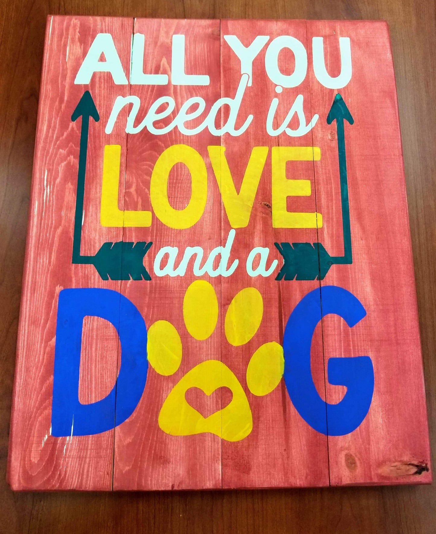 All you need is love and a dog with arrows and pawprint